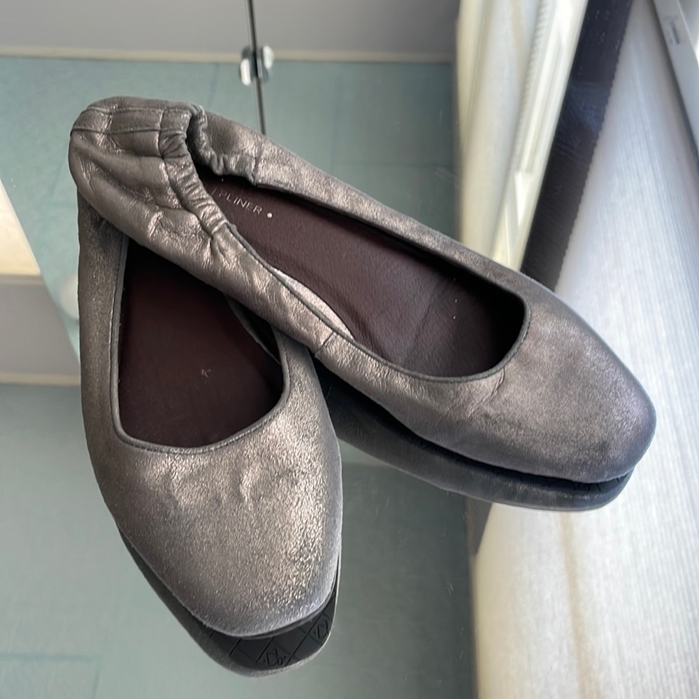 Donald J. Pliner soft leather flats, silver/pewter in color, size 9.